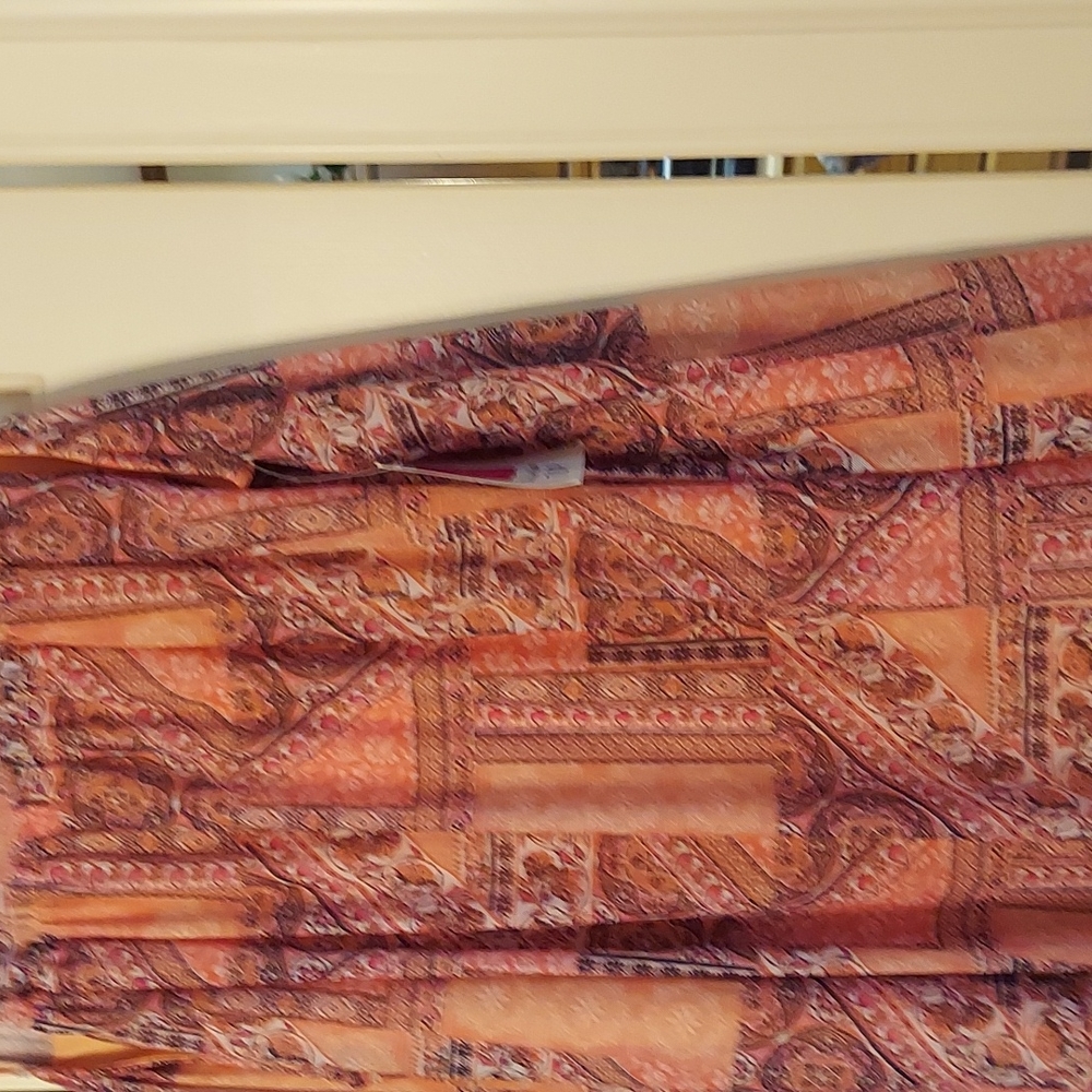 Bobbie Brooks Plus Size 2 X Sheer style top Melon Color with abstract pattern.